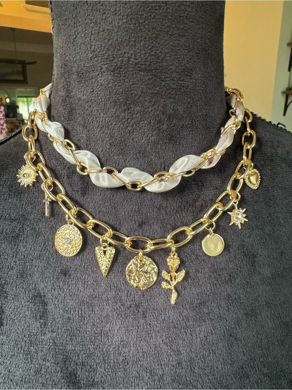 Gold Tone Layered Charm Necklace with Cream Ribbon